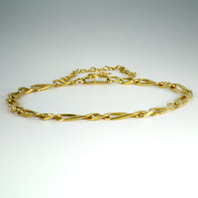 Load image into Gallery viewer, 18 Karat Yellow Gold Twisted Figaro Curb Link Bracelet
