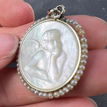 Load image into Gallery viewer, French Mother of Pearl Rafael’s Cherub 18K White Gold Seed Pearl Medal Pendant
