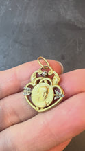 Load and play video in Gallery viewer, French Vernon Triumph of Love Cupid 18K Yellow Gold Diamond Love Pendant
