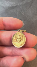 Load and play video in Gallery viewer, French Grun Raphael’s Cherub 18K Yellow Gold Medal Pendant

