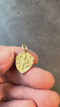 Load and play video in Gallery viewer, Antique French First Communion Jesus Christ Shield 18K Yellow Gold Pendant
