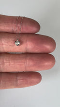 Load and play video in Gallery viewer, Heart-Shaped Diamond 0.14 Carat Platinum Charm Pendant Necklace
