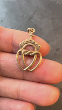 Load and play video in Gallery viewer, French Intertwined Crowned Sacred Hearts 18K Yellow Gold Charm Pendant
