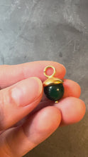 Load and play video in Gallery viewer, green and gold pendant held and turned in hand
