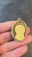 Load and play video in Gallery viewer, French 18K Yellow Gold Seed Pearl Bakelite Virgin Mary Charm Pendant
