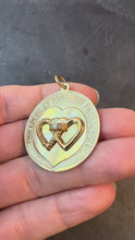 Load and play video in Gallery viewer, Merrin Marriage Two Hearts for Life 14K Yellow Gold Diamond Love Charm Pendant
