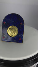 Load and play video in Gallery viewer, Cartier Becker St Christopher 18 Karat Yellow Gold Medal Lapis Lazuli Ruby Frame
